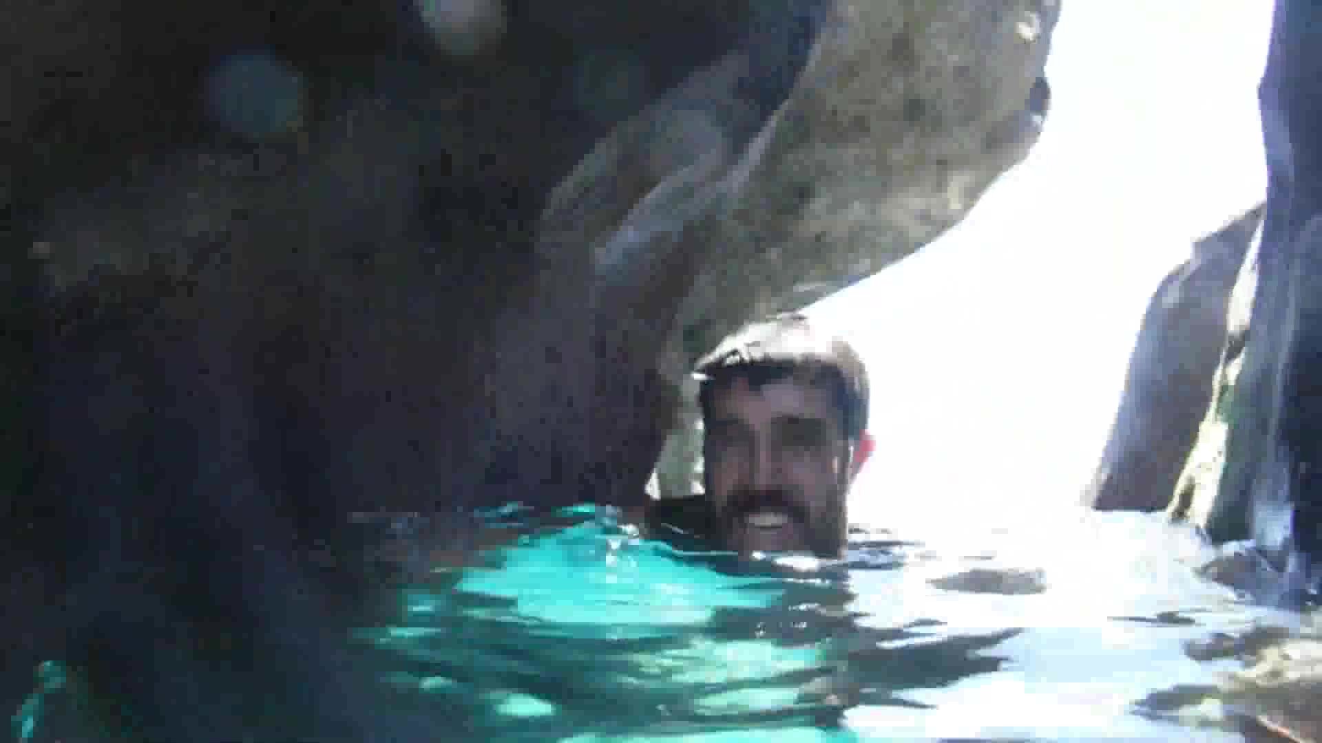 Bearded barefaced cutie underwater in wetsuit