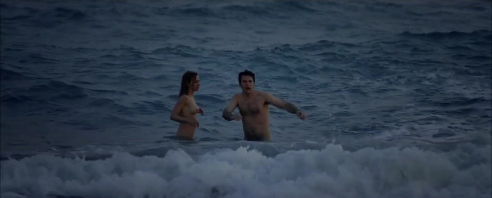 Movie scene - Left naked on the beach