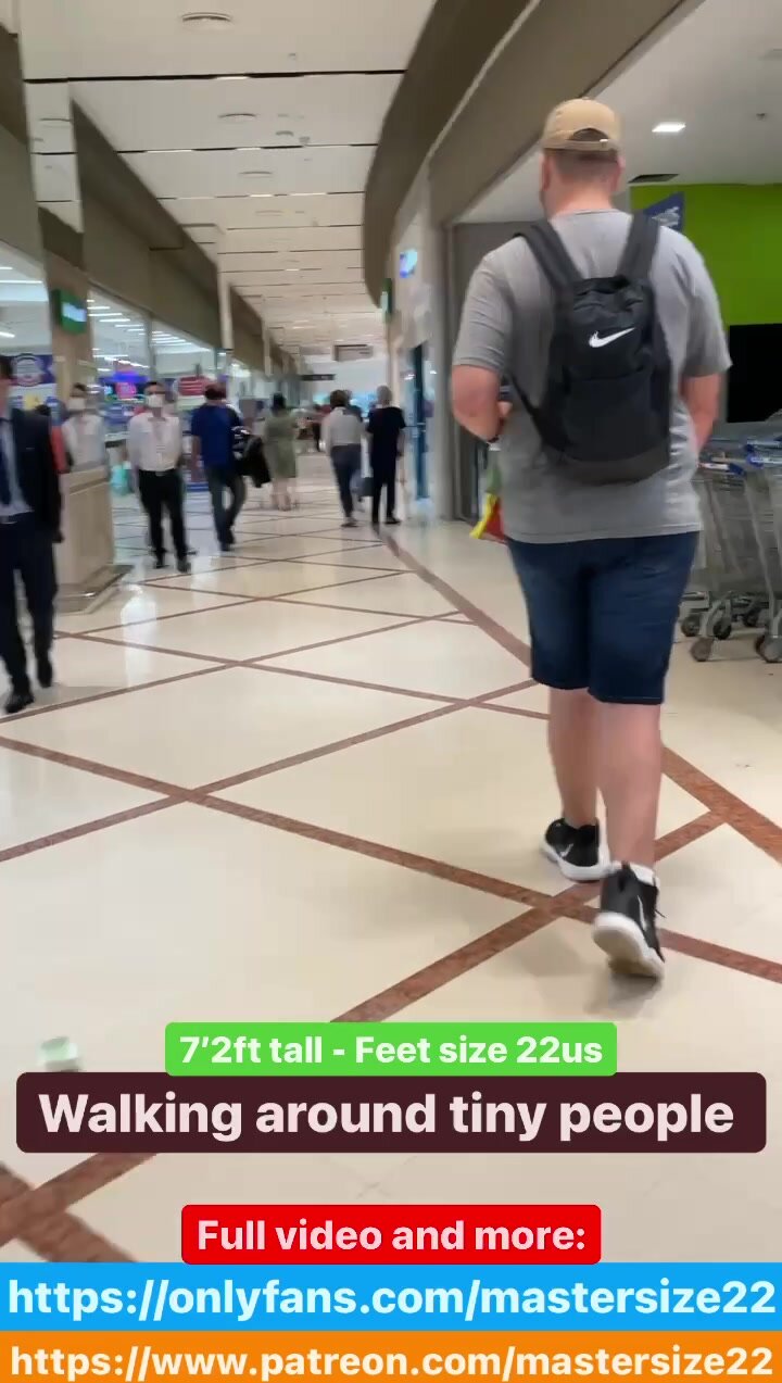 Giant walking around tiny people - 7’2ft tall