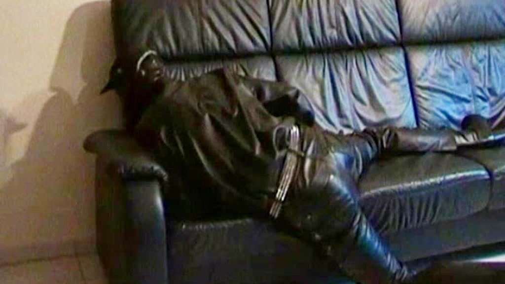 horny leather boy on leather sofa