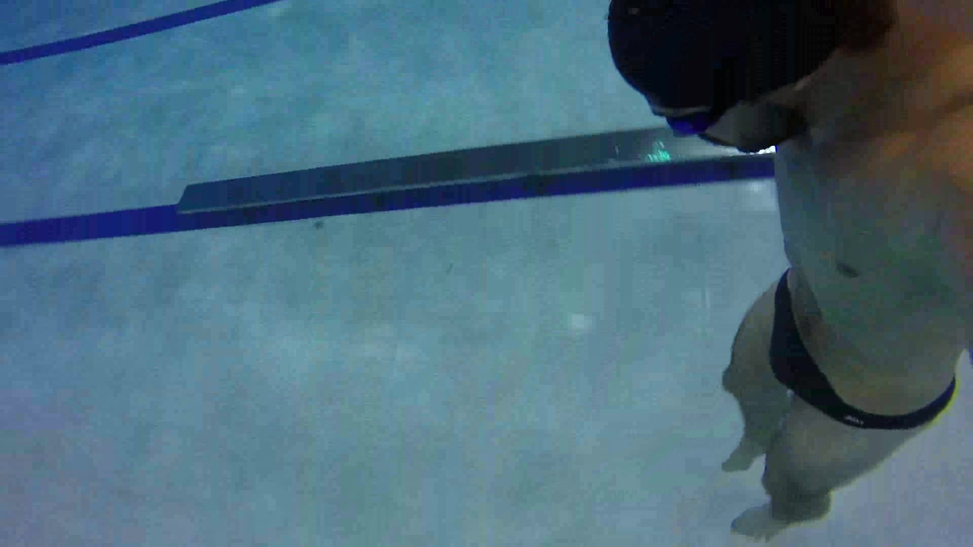 Russian swimmer underwater in black speedos