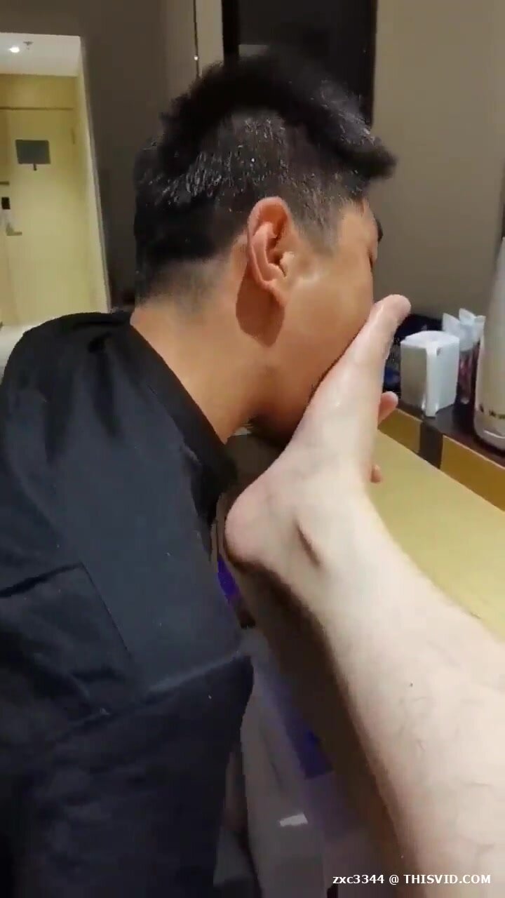 Asian licks and sucks feet