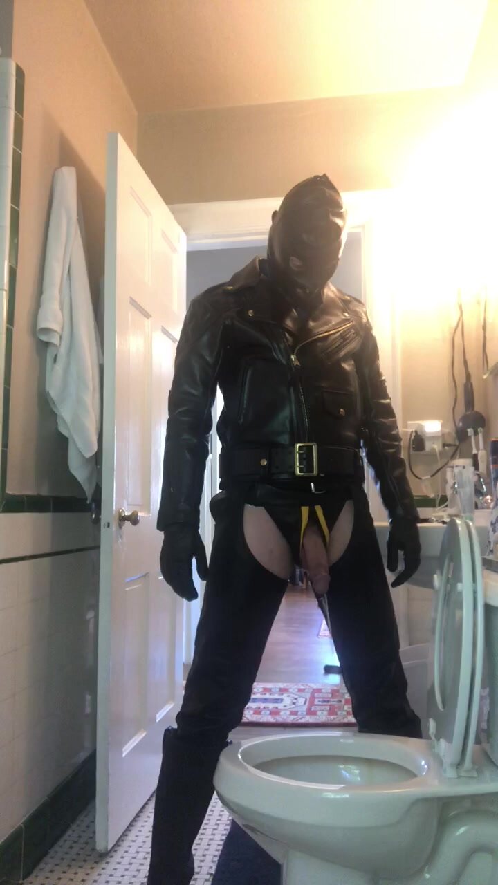 Leather daddy takes a piss