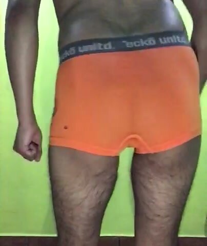 Farting in orange boxer