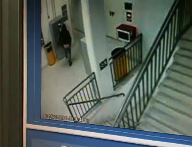 CCTV woman piss staircase stairwell floor 01