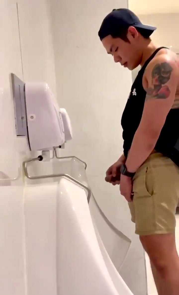 Asian guy in the toilet