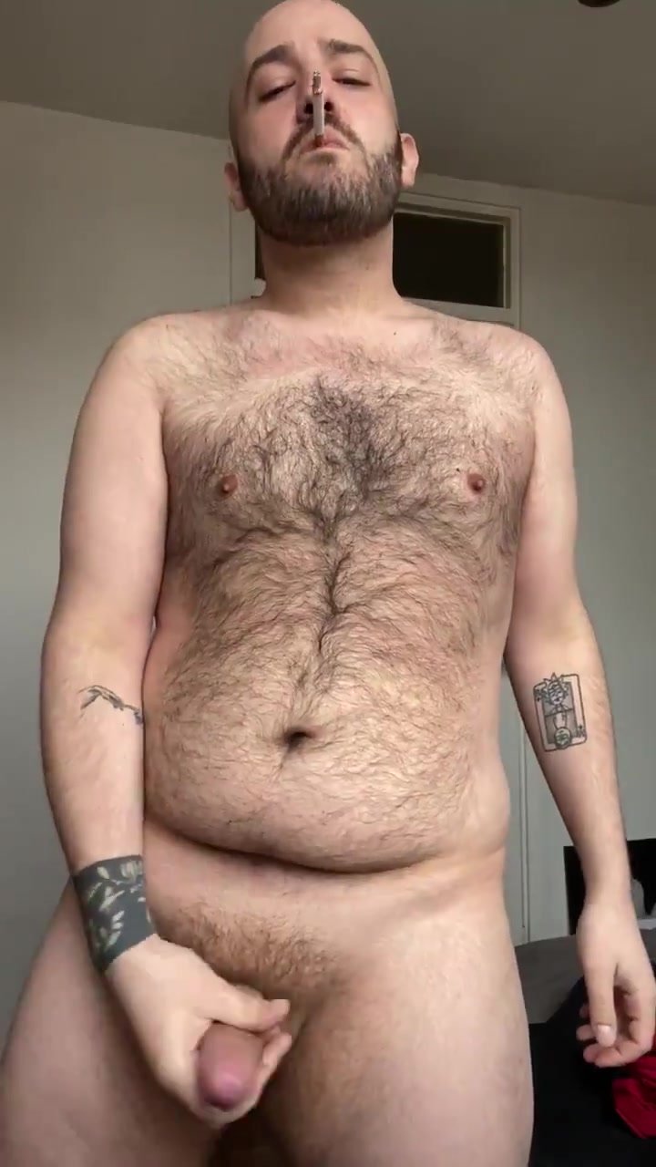 Hairy smoker wanks and cums