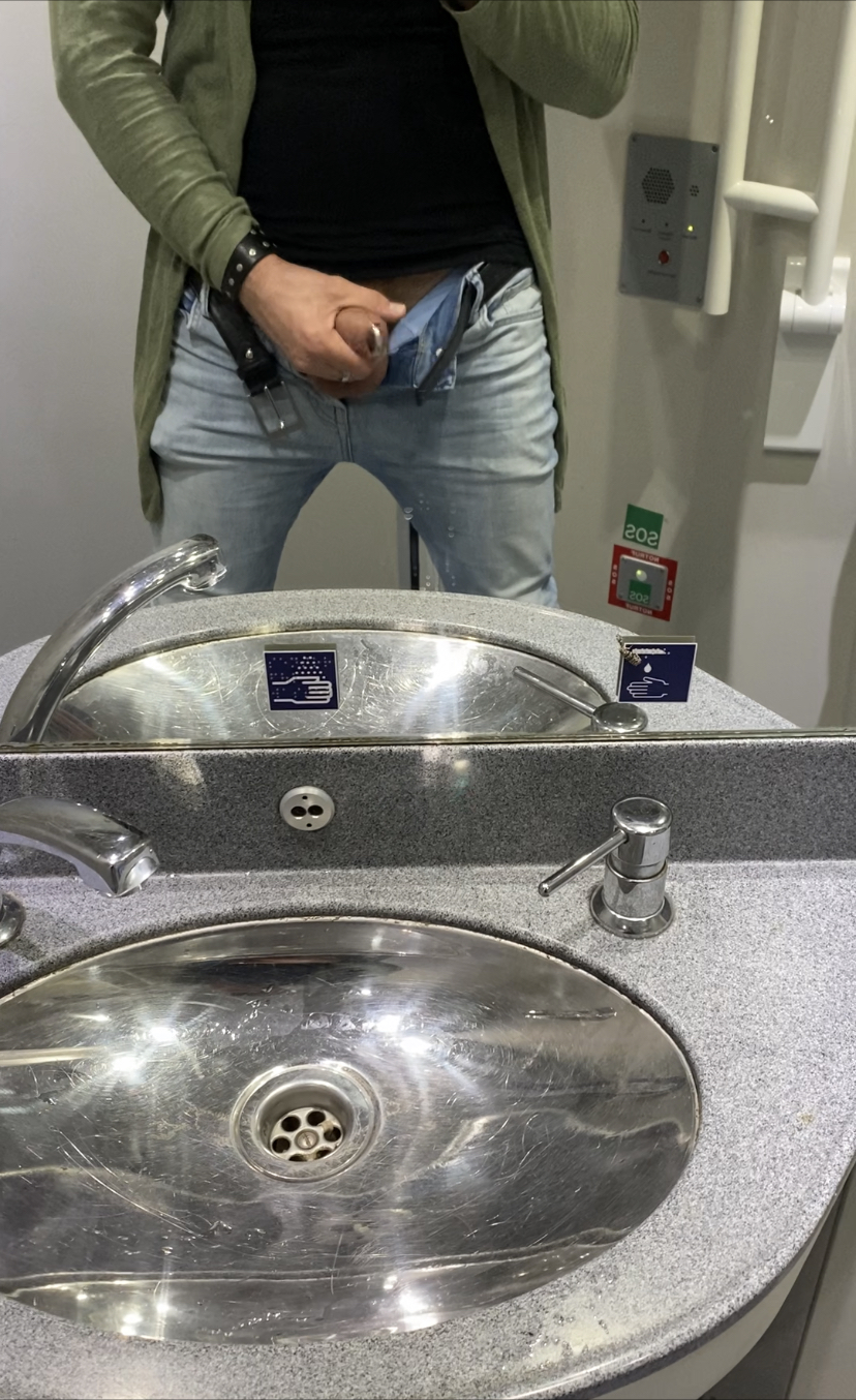 Cumshot in a train toilet