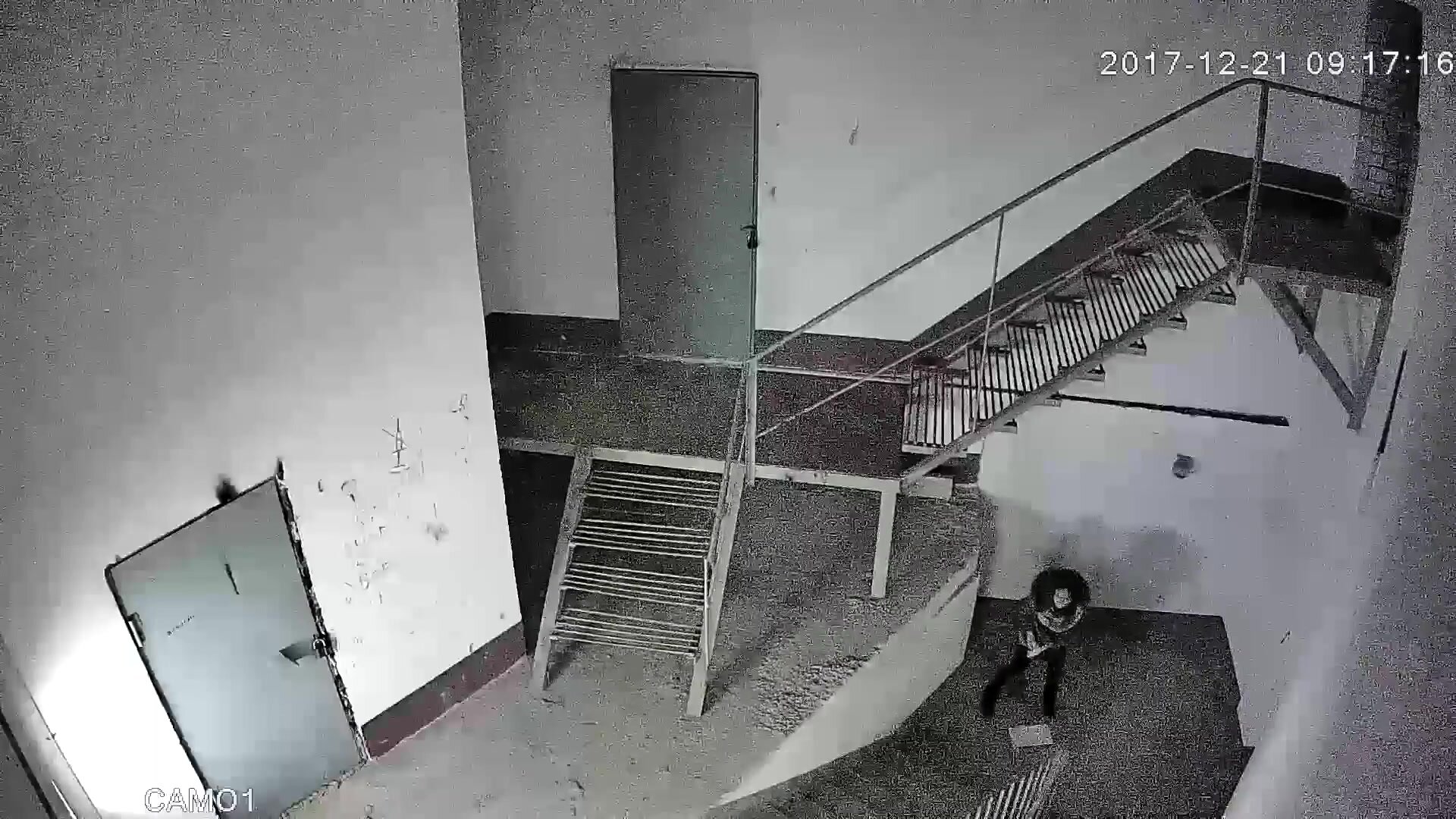 Woman poops under stairs