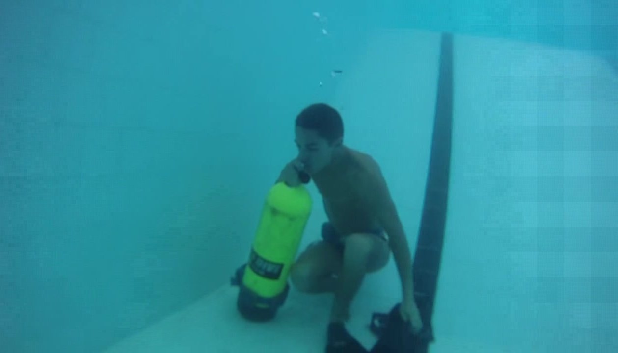 Underwater speedo boy breatholding