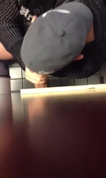 Blowing a nice dick at a public toilet