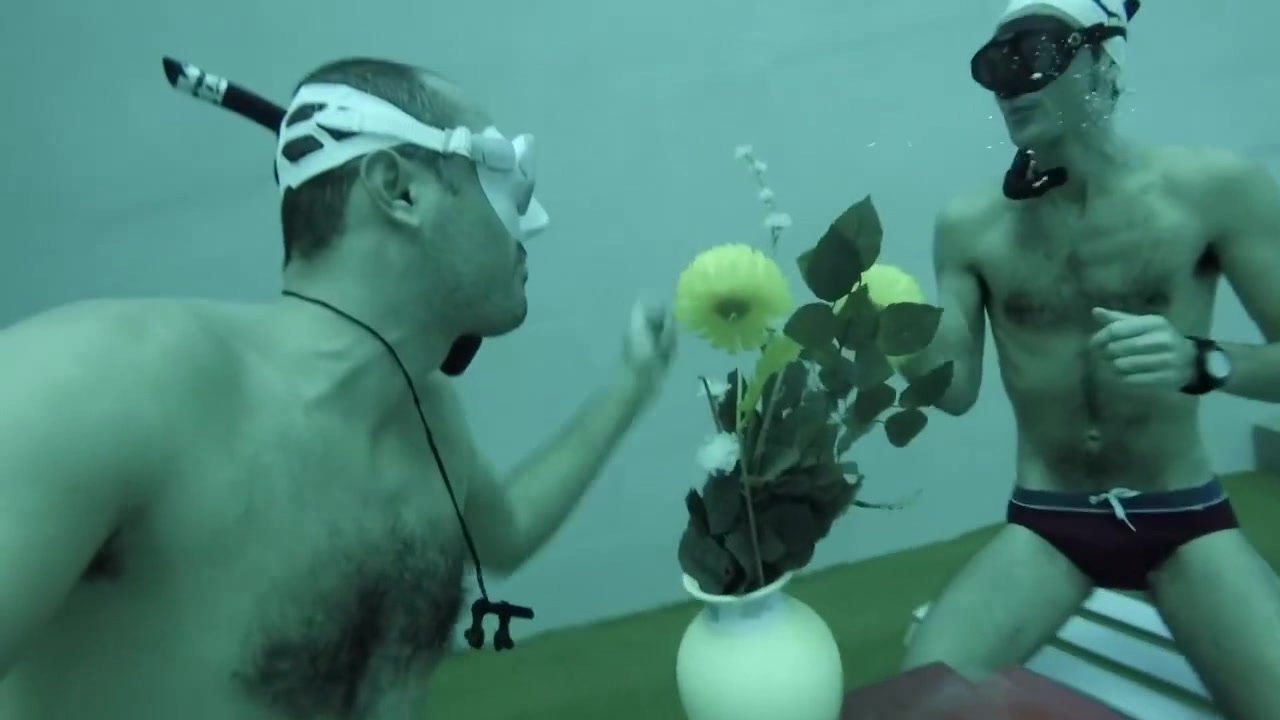 Spanish freedivers breatholding underwater in pool