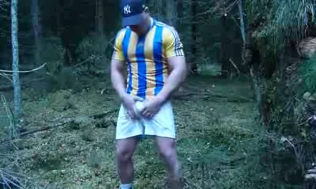 Bodybuilder jerking off in the woods