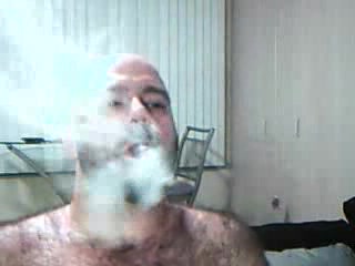 Hot hairy bear smoking cigar