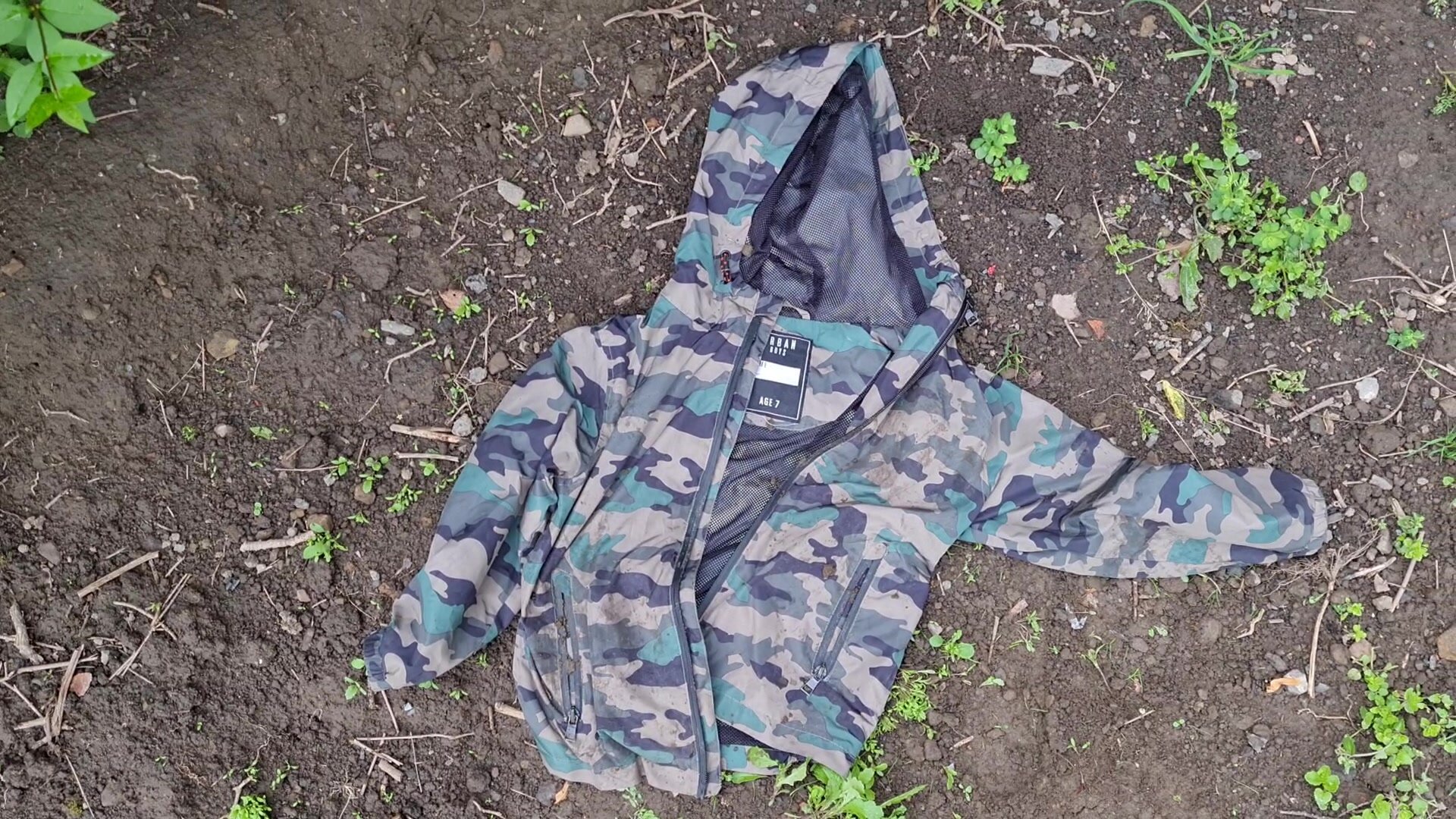 Lost and found,  pissing on boys camo windbreake jacket