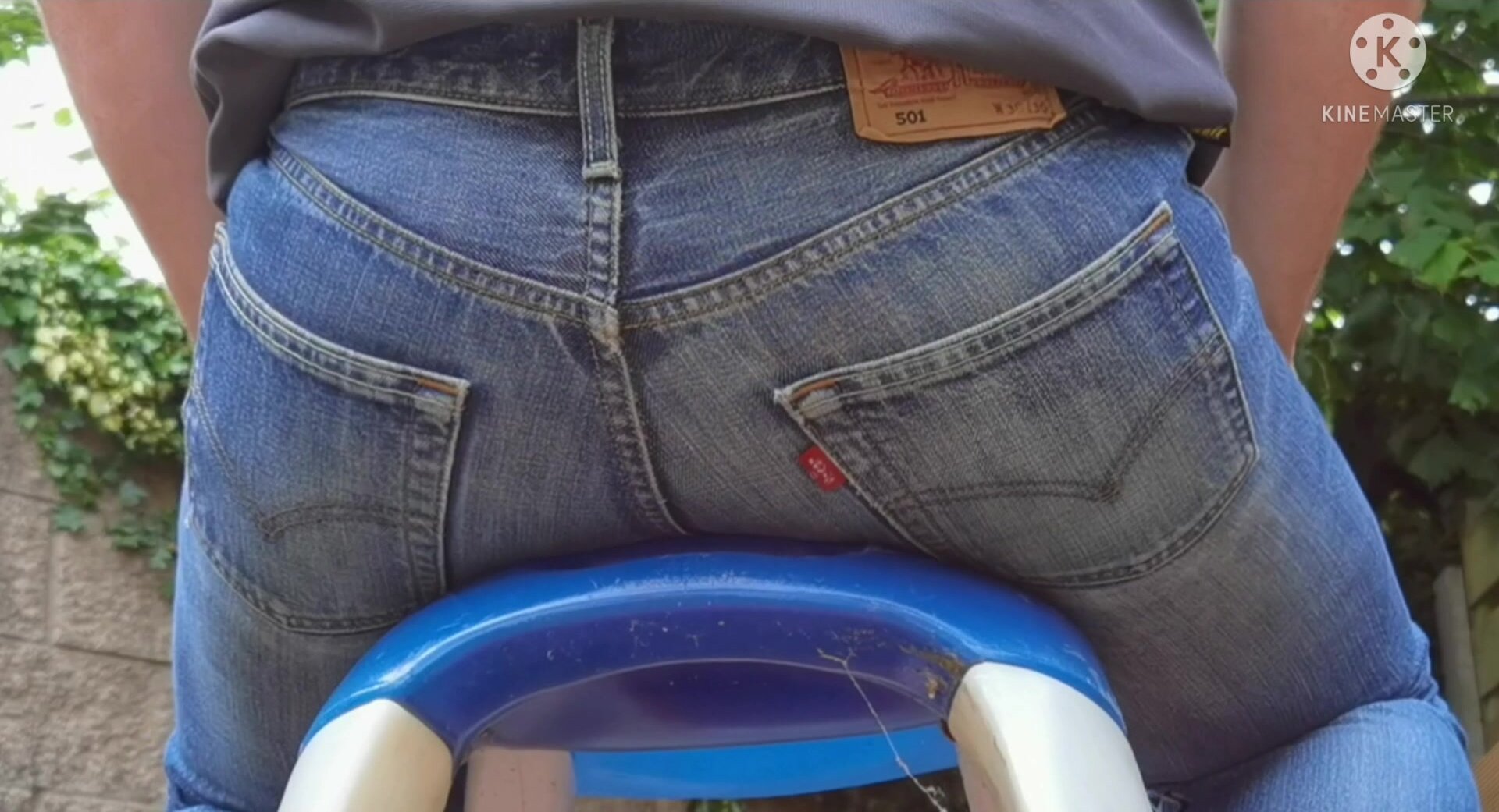 Sitting on toy car in old tight levis 501s - video 3