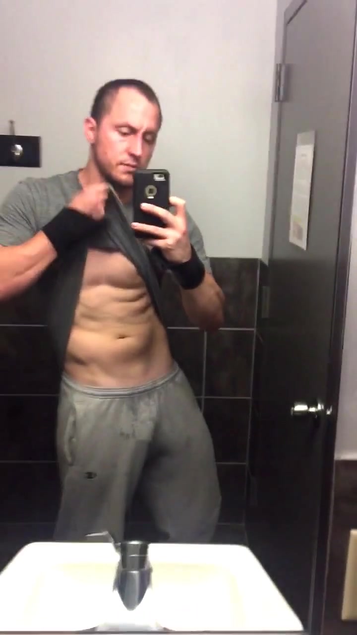 Straight guy with big bulge flexing