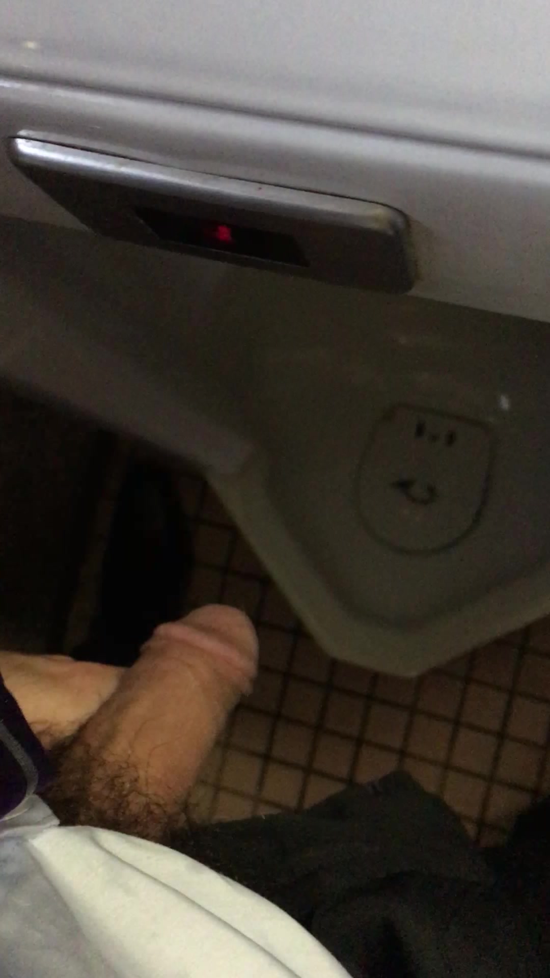 Pissing in urinal in park