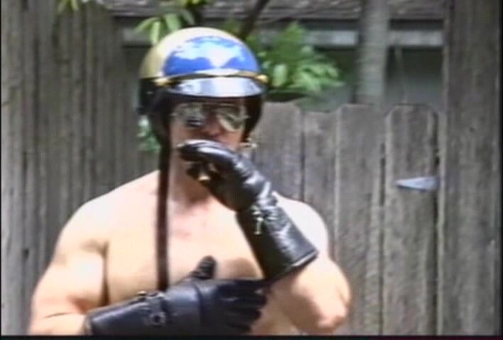 Muscle bear cop in leather gloves jerks off SOLO .