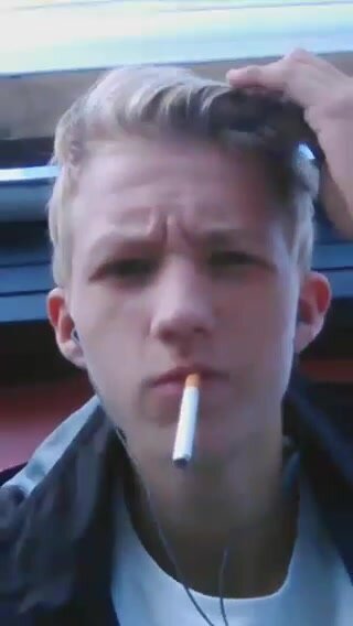 Young Blonde Guy Smoking 1