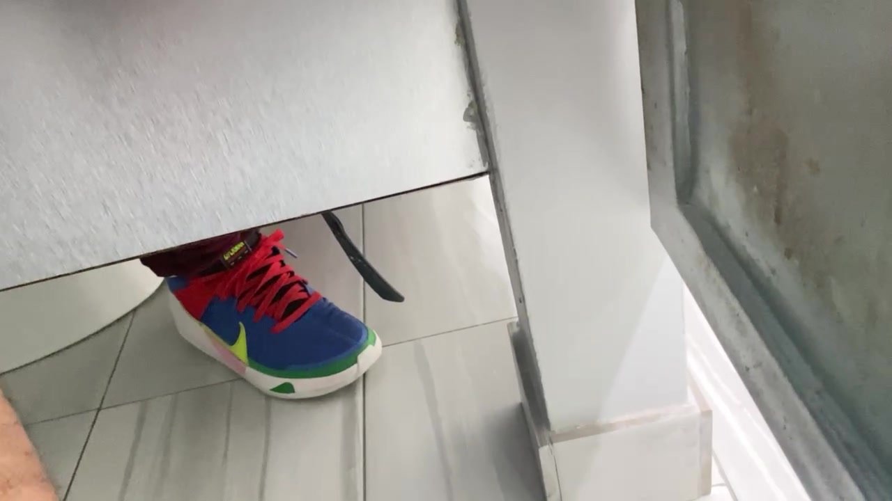 Guy letting out gas in restroom - video 3
