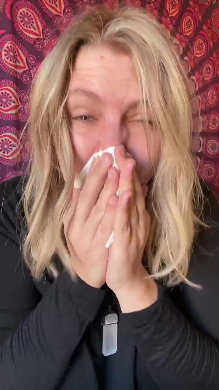 Blond Girl Sneezing