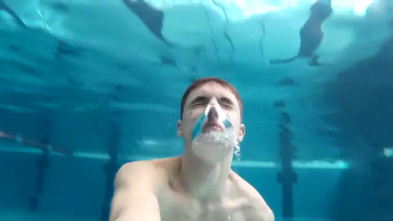 Underwater barefaced buddies in pool - video 6