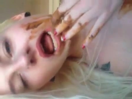 Blonde Babe Smearing and Tasting Shit