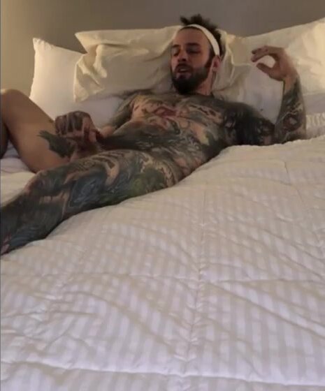 amazing nick on his bed naked