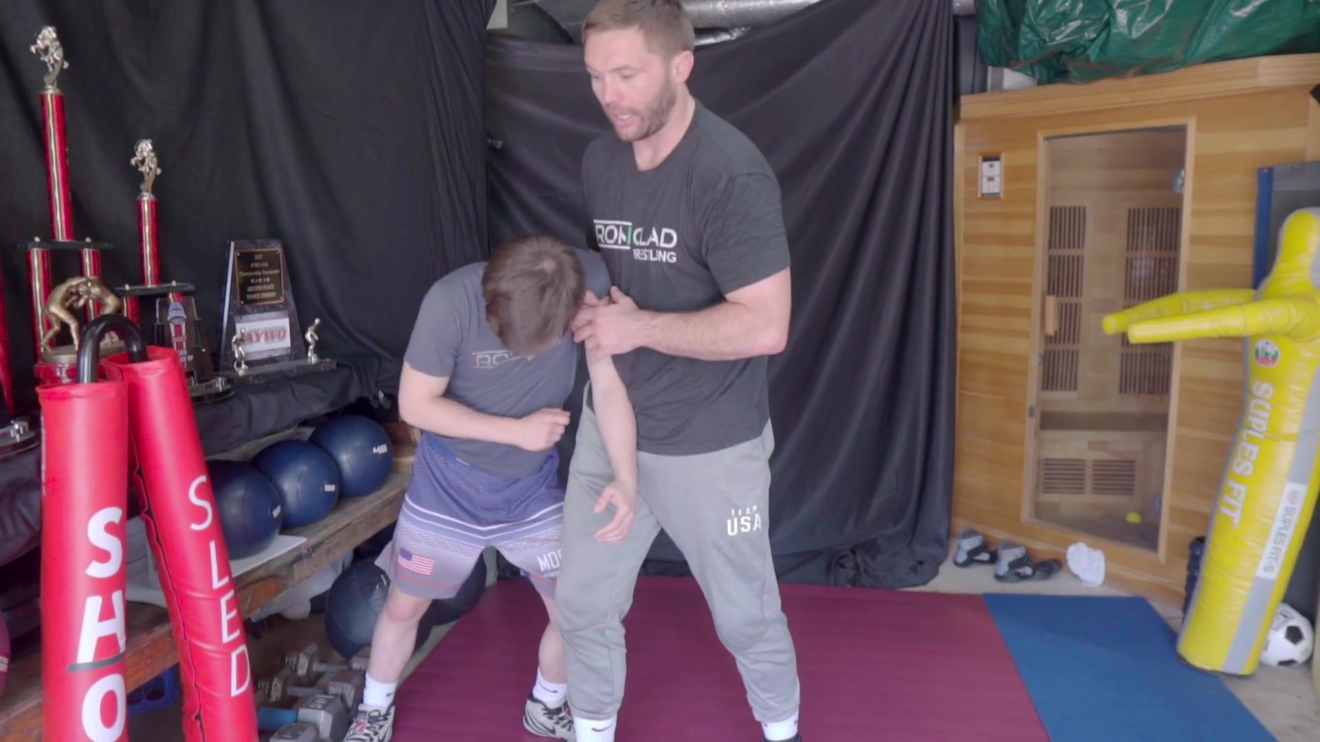 coach not afraid to be hands on with wrestler