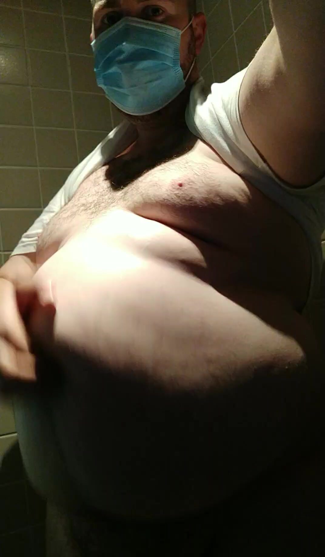 Fat gainer jerks off in public toilet