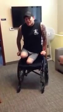 DAK in wheelchair doing a dance
