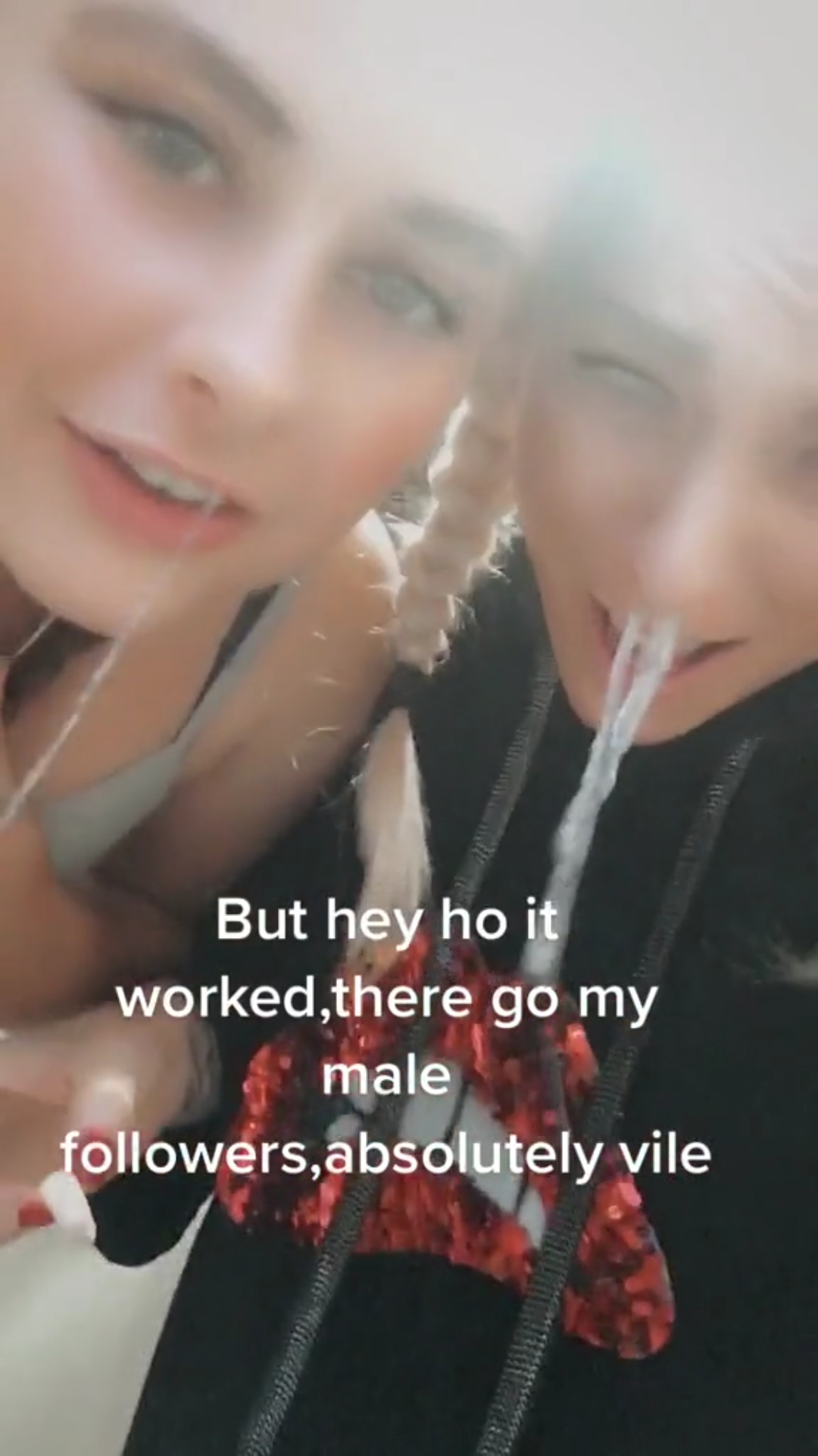 Two snot girls laughing and showing their snot