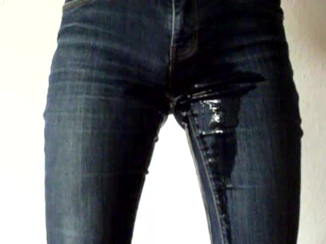 Girl wetting jeans