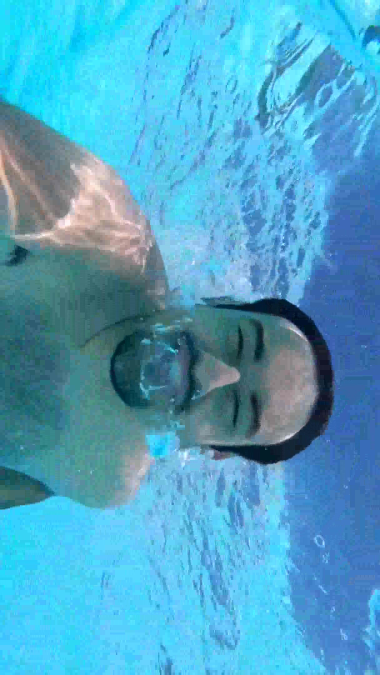 Swimming barefaced underwater in pool - video 6