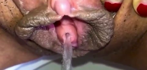 Extreme Closeup Of Peeing Meaty Pussy