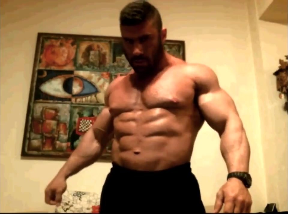 Greek bodybuilder flex