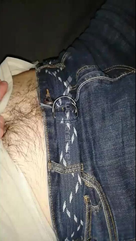 Playing with boys navel