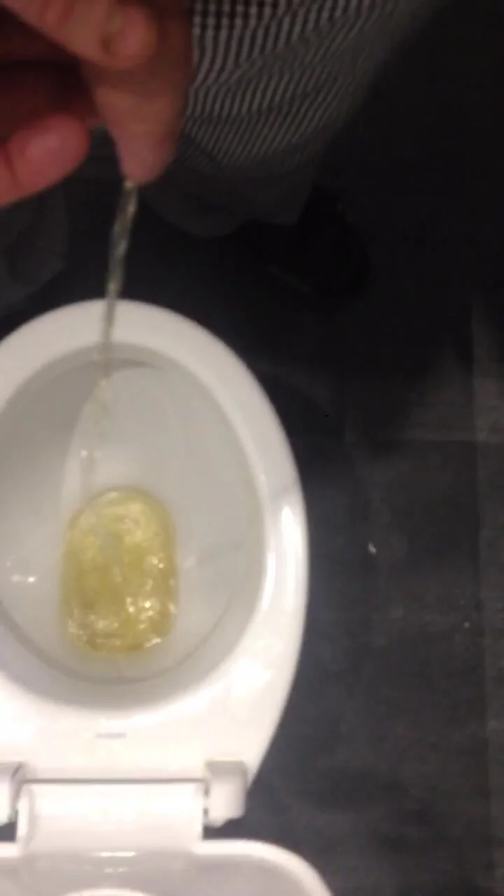 Really long piss at toilet lid porn