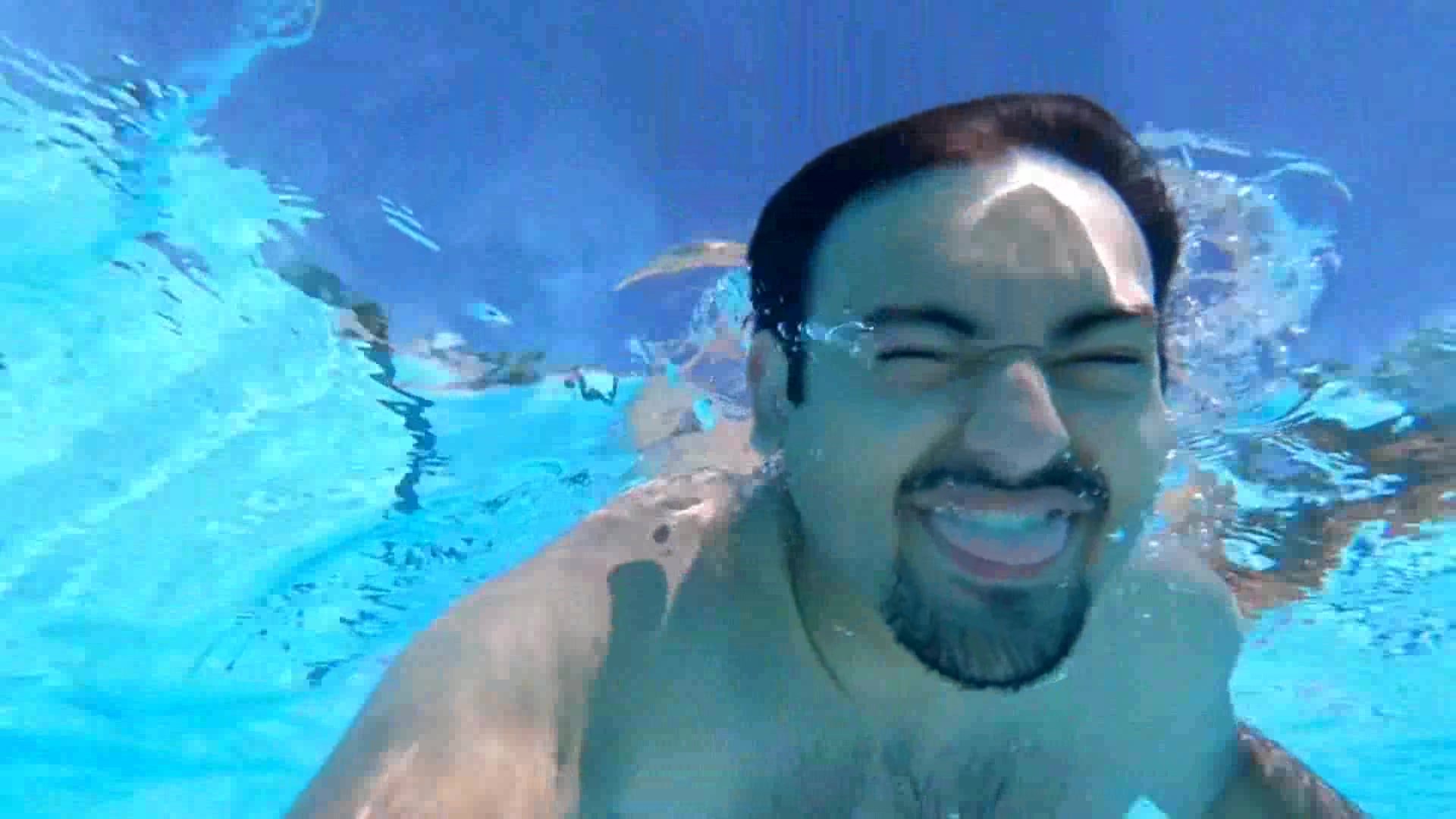 Buddies swimming barefaced underwater - video 2