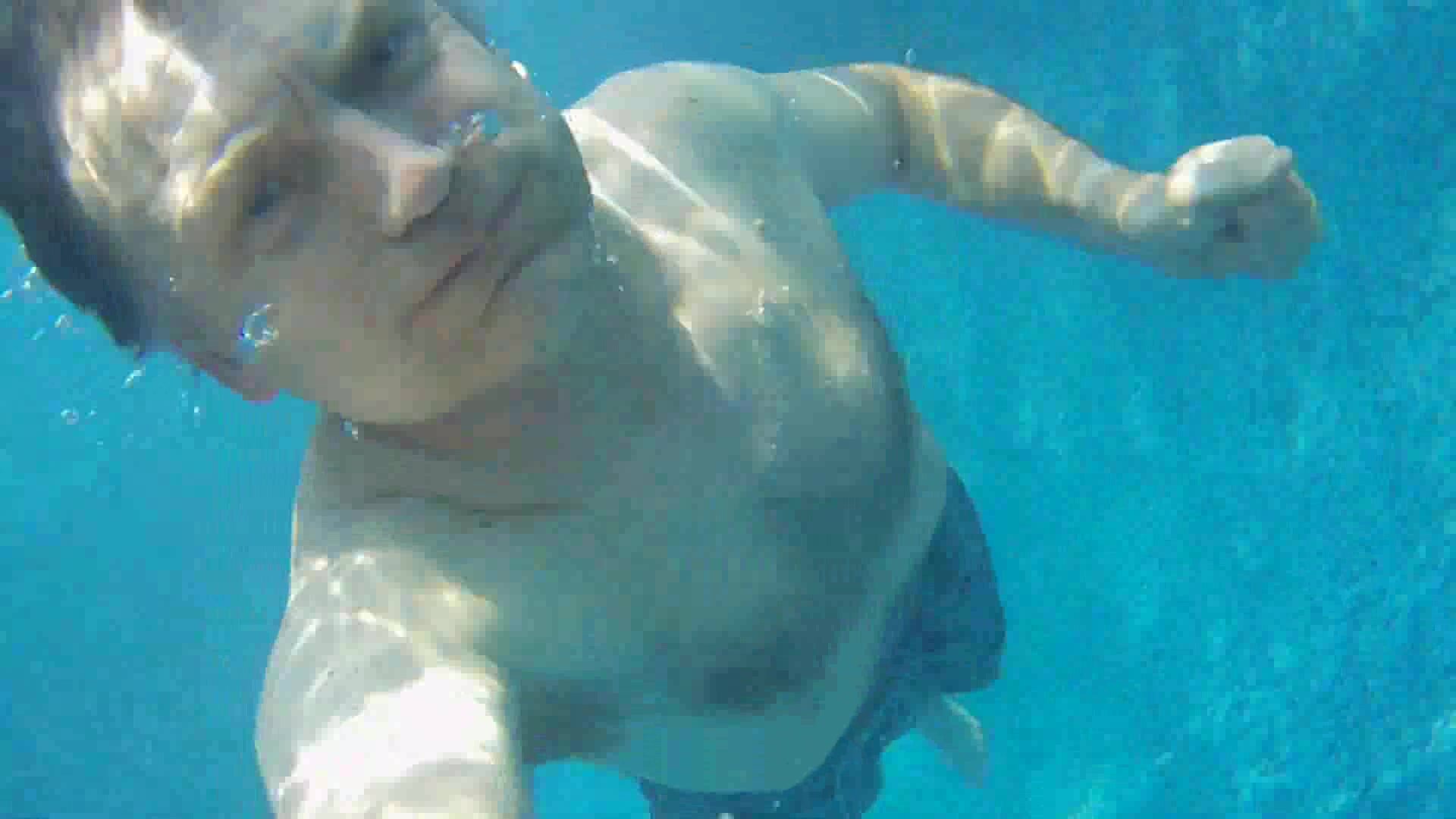 Underwater barefaced daddy in pool