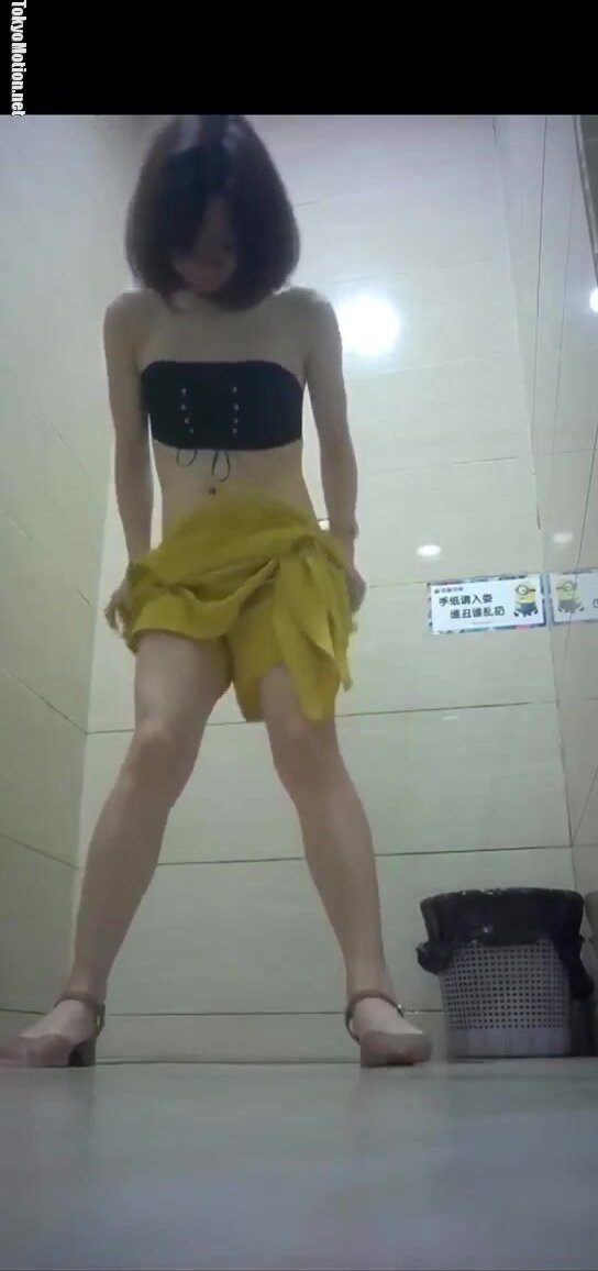 Beautiful Chinese girl pissing with pad