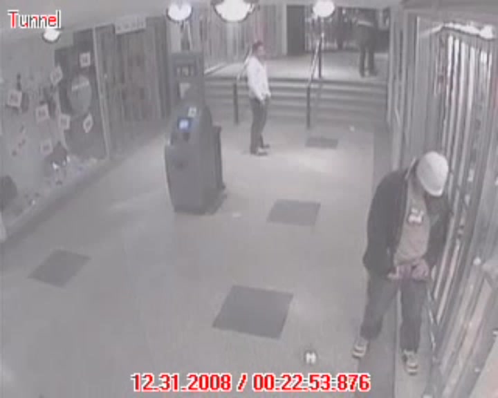 Guys caught pissing on store display
