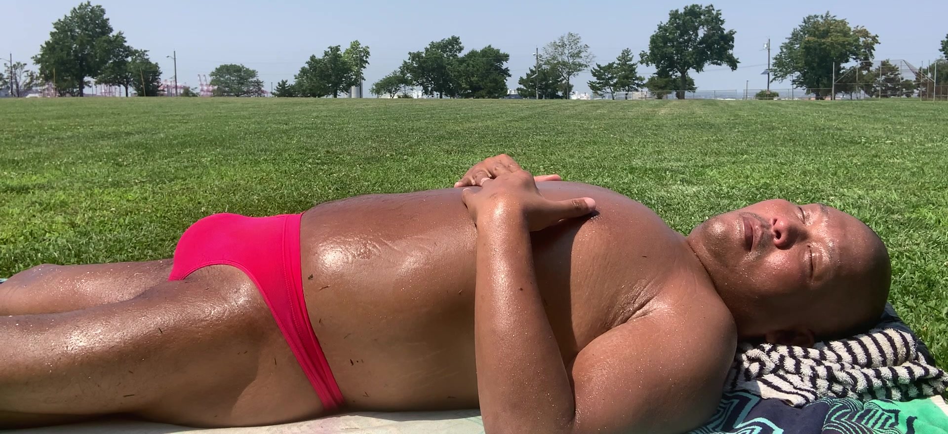 Sunbathing in  Sexy Hot Pink thong