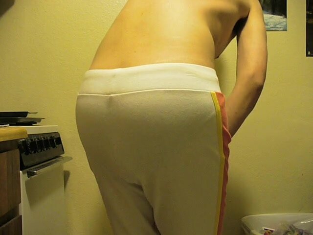 Pooping in white sweatpants