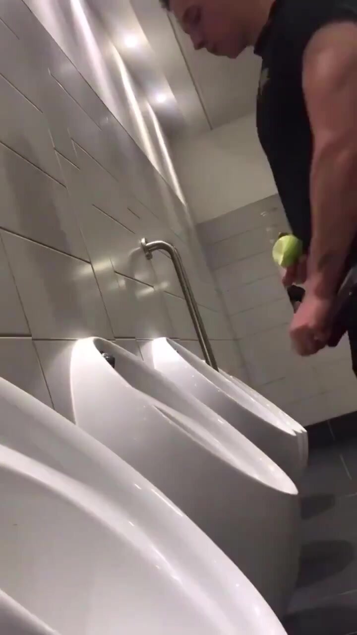Brit lad at urinal
