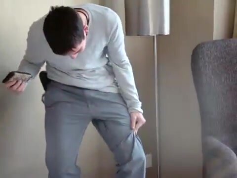 Guy peeing his sweatpants