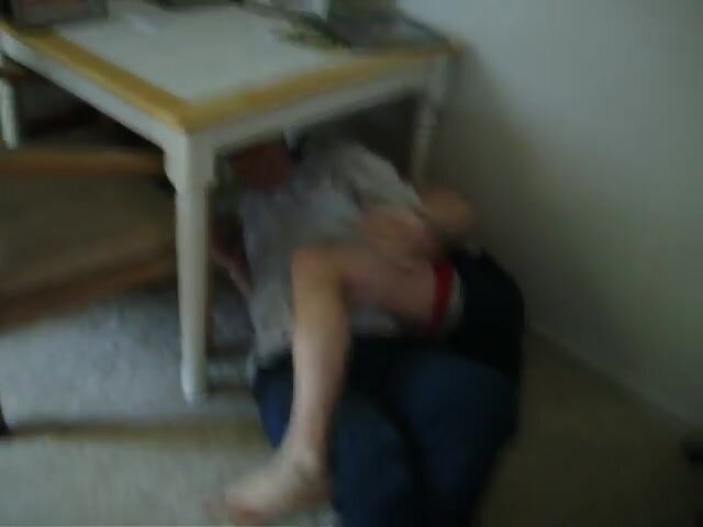 older brother tickles younger brother