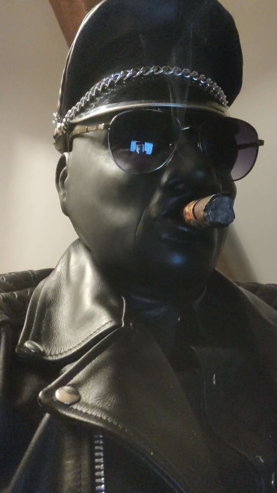 Smoking cigar in minermask
