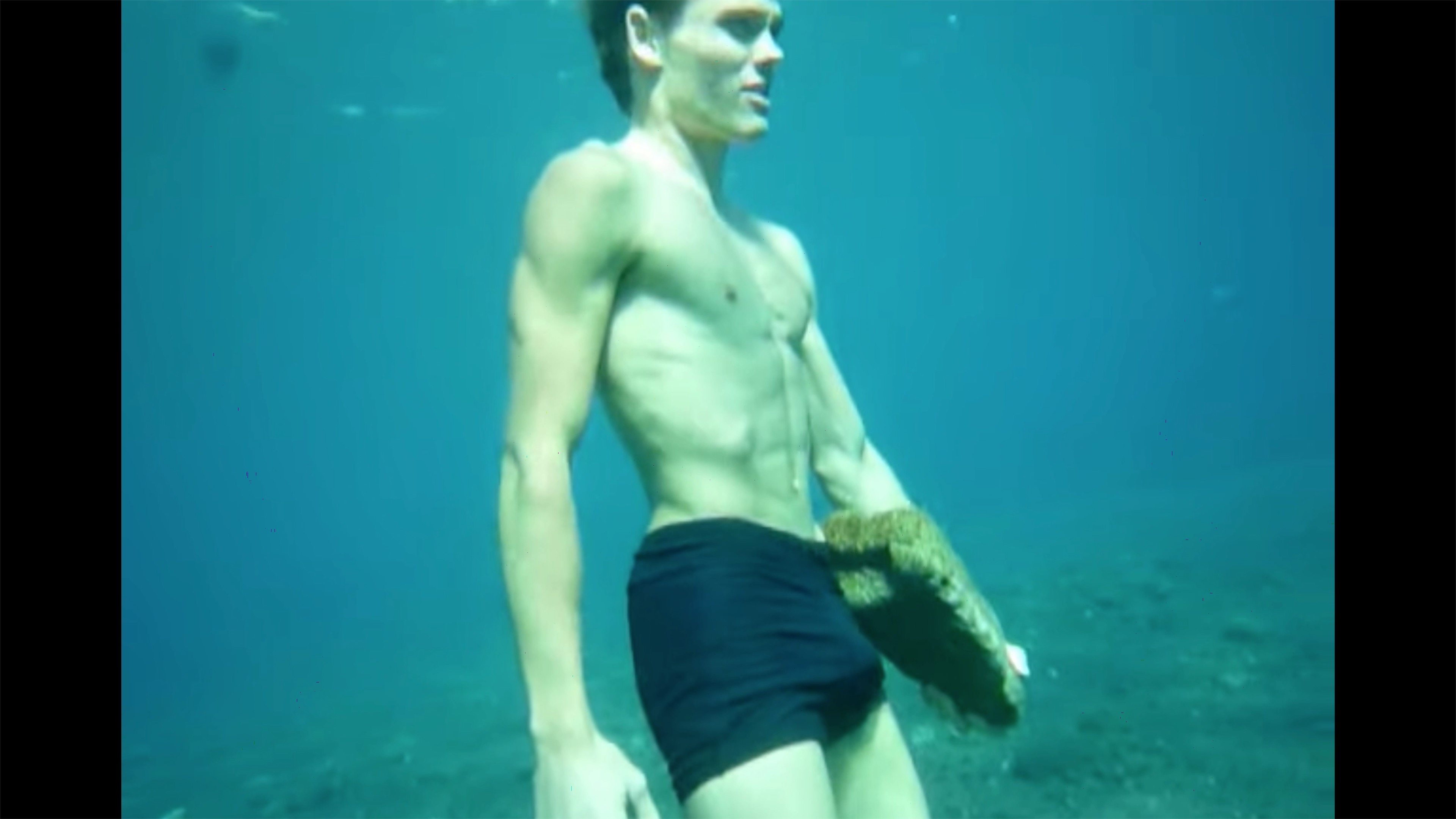 Underwater Freediver Bulging in his Tight Briefs